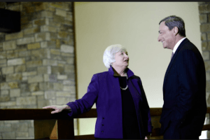 Janet Yellen, chairman of the US Federal Reserve, left, speaks with Mario Draghi, president of the European Central Bank, during the Jackson Hole economic