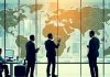 Investors collaborating in a modern global financial setting.
