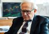 Warren Buffett deep in thought in his office.