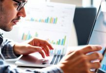 Person using a laptop for financial analysis and planning.