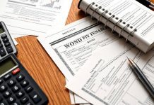 Bonds and financial documents on a wooden desk.