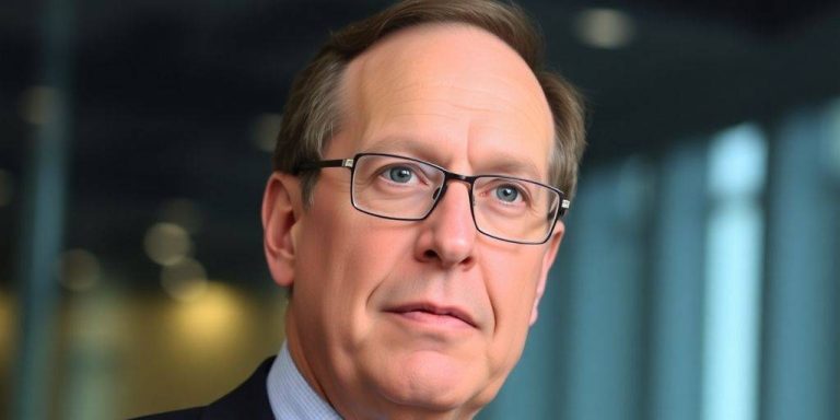 Larry Fink in a corporate office, focused and professional.