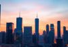 Urban skyline at twilight representing private equity future.