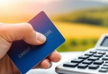 Credit card and calculator on a financial background.