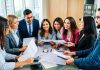Diverse business team collaborating in a modern office.