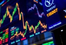 Colorful stock market display with dynamic trading floor atmosphere.