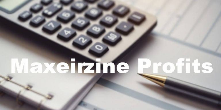 Calculator and financial documents on a workspace table.