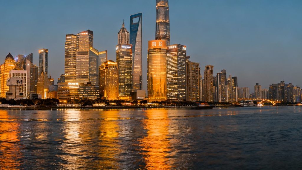 Shanghai skyline at dusk with financial district buildings.