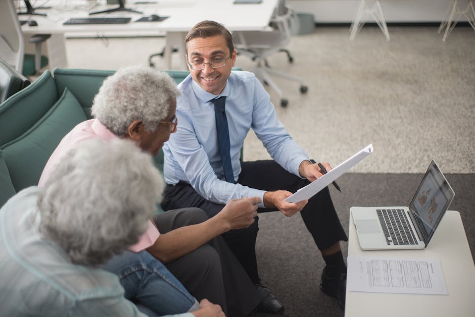 A financial advisor reviewing insurance options with a client